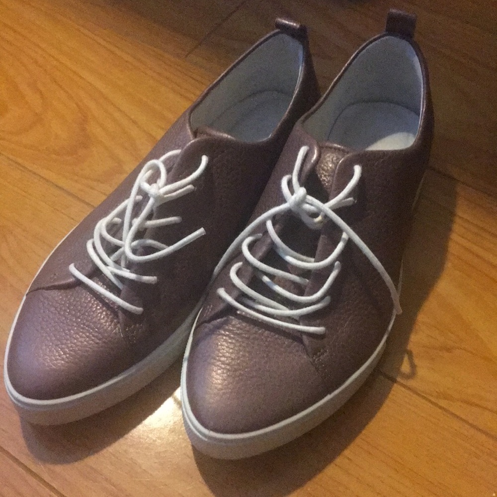 Woman’s soft leather sneakers.
